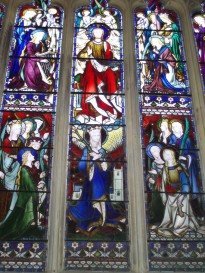 Women in Christ's service, window in church in England/Photo by author